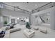Spacious living room with soaring ceilings, a balcony, and an open-concept design at 8809 Barium Rock Ave, Las Vegas, NV 89143