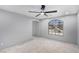 Inviting space featuring an arched window with neighborhood views and an open entryway at 8809 Barium Rock Ave, Las Vegas, NV 89143