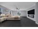 Serene main bedroom with fireplace, ceiling fan, and private balcony offering a peaceful retreat at 8809 Barium Rock Ave, Las Vegas, NV 89143