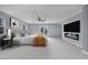 Serene main bedroom with fireplace, ceiling fan, and private balcony offering a peaceful retreat at 8809 Barium Rock Ave, Las Vegas, NV 89143