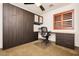 This bedroom features a sleek Murphy bed, desk area, and stylish shutters at 9050 W Tropicana Ave # 1102, Las Vegas, NV 89147