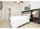 Modern bedroom features a statement headboard, sleek nightstands, and recessed lighting at 9050 W Tropicana Ave # 1102, Las Vegas, NV 89147