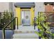 Inviting front entrance with modern door, plants, and stylish exterior at 9050 W Tropicana Ave # 1102, Las Vegas, NV 89147