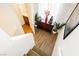 Staircase leading down to landing area with console table and bathroom at 9050 W Tropicana Ave # 1102, Las Vegas, NV 89147