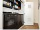 Laundry room with new washer and dryer units and shelving at 9050 W Tropicana Ave # 1102, Las Vegas, NV 89147
