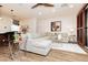 Spacious living area featuring modern decor, a large sectional, and hardwood floors at 9050 W Tropicana Ave # 1102, Las Vegas, NV 89147
