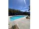Community pool with clear water and comfortable lounging areas around the pool at 9050 W Tropicana Ave # 1102, Las Vegas, NV 89147