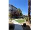 Community walkway featuring manicured landscaping and pathway at 9050 W Tropicana Ave # 1102, Las Vegas, NV 89147