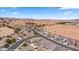 Community aerial showing neighborhood homes and the surrounding desert landscape at 942 Shadow Hawk Rdg, Mesquite, NV 89027