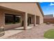 Backyard patio with putting green and desert landscaping against a clear sky at 942 Shadow Hawk Rdg, Mesquite, NV 89027