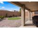 Backyard featuring a covered patio and a putting green at 942 Shadow Hawk Rdg, Mesquite, NV 89027
