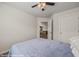 Inviting bedroom featuring a cozy bed and an open doorway at 942 Shadow Hawk Rdg, Mesquite, NV 89027
