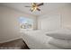 Bedroom with natural light, ceiling fan and closet space for optimal comfort at 942 Shadow Hawk Rdg, Mesquite, NV 89027