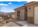 Attractive single-story home with desert landscaping, stone accents, and an attached two-car garage at 942 Shadow Hawk Rdg, Mesquite, NV 89027