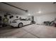 Spacious garage with car, motorcycles, bikes and ample storage space at 942 Shadow Hawk Rdg, Mesquite, NV 89027
