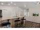Open kitchen with breakfast bar overlooking the living area at 942 Shadow Hawk Rdg, Mesquite, NV 89027