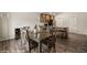 Kitchen with breakfast bar, wood cabinets and adjacent dining area at 942 Shadow Hawk Rdg, Mesquite, NV 89027
