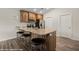 Kitchen island featuring granite countertop and seating at 942 Shadow Hawk Rdg, Mesquite, NV 89027