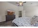 Main bedroom with a ceiling fan, carpeted floors, and a view of the closet and door at 942 Shadow Hawk Rdg, Mesquite, NV 89027