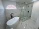 Elegant bathroom highlighting a sleek tub and glass shower at 10574 Salmon Leap St, Las Vegas, NV 89183
