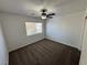 Bright bedroom features neutral walls, ceiling fan and plush carpeting at 10574 Salmon Leap St, Las Vegas, NV 89183