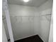 Walk-in closet with neutral carpet and wire shelving for ample storage at 10574 Salmon Leap St, Las Vegas, NV 89183