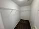 Walk-in closet with neutral carpet and wire shelving for ample storage at 10574 Salmon Leap St, Las Vegas, NV 89183