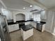 Stylish kitchen with stainless steel appliances, granite countertops, and a center island at 10574 Salmon Leap St, Las Vegas, NV 89183