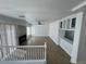 Loft view of the open-concept living area with dining space and views of the front door at 10574 Salmon Leap St, Las Vegas, NV 89183