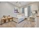 Cozy bedroom with soft natural light and a neutral color palette at 10632 Clarion Ln, Las Vegas, NV 89134