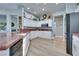 Updated kitchen featuring stainless appliances, granite countertops, and ample cabinet space at 10632 Clarion Ln, Las Vegas, NV 89134