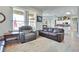 Comfortable living room offers ample seating and natural light, perfect for relaxing and entertaining guests at 10632 Clarion Ln, Las Vegas, NV 89134