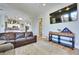 Spacious living room with open-concept kitchen area and stylish decor for a modern feel at 10632 Clarion Ln, Las Vegas, NV 89134