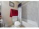 Bright bathroom with a tub, shower and decorative tile, with a neutral color palette at 1150 N Buffalo Dr # 1007, Las Vegas, NV 89128