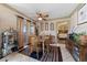 Dining area adjacent to the kitchen and sliding glass doors at 1150 N Buffalo Dr # 1007, Las Vegas, NV 89128