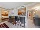 Eat-in kitchen featuring a breakfast bar at 1150 N Buffalo Dr # 1007, Las Vegas, NV 89128
