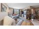 Bright living room with hardwood floors and entertainment center at 1150 N Buffalo Dr # 1007, Las Vegas, NV 89128