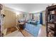 Inviting living room with laminate floors and comfortable seating at 1150 N Buffalo Dr # 1007, Las Vegas, NV 89128