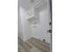 Laundry closet features built in shelving, rod, modern flooring, and hookups at 134 Saint Albans Dr, Henderson, NV 89015