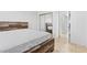This bedroom offers a closet with mirrored doors and a modern wood-paneled bed frame at 1411 Di Blasi Dr # 104, Las Vegas, NV 89119