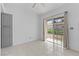 Sun-filled bedroom featuring a sliding glass door leading to the outdoors at 1411 Di Blasi Dr # 104, Las Vegas, NV 89119