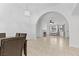 Dining room with open access to living area and stone fireplace at 1411 Di Blasi Dr # 104, Las Vegas, NV 89119