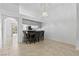 Cozy dining area with modern chandelier adjacent to open kitchen space at 1411 Di Blasi Dr # 104, Las Vegas, NV 89119