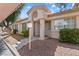Charming townhome featuring desert landscaping and a welcoming entrance at 1411 Di Blasi Dr # 104, Las Vegas, NV 89119