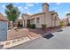 Beautiful townhome exterior with desert landscaping and mailbox cluster at 1411 Di Blasi Dr # 104, Las Vegas, NV 89119