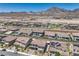 Expansive aerial view of the community with mountain views and well-maintained landscaping at 201 Carmel Sky St, Las Vegas, NV 89138