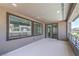Exterior patio space features stucco walls, recessed lighting, and neighborhood views at 201 Carmel Sky St, Las Vegas, NV 89138