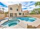 Stunning backyard features a beautiful pool, and spa, perfect for outdoor entertaining at 2107 Fountain Springs Dr, Henderson, NV 89074