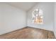 Bedroom featuring wood-look floors and large windows at 2107 Fountain Springs Dr, Henderson, NV 89074
