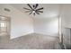 Bedroom with vaulted ceiling, modern fan, and fireplace at 2107 Fountain Springs Dr, Henderson, NV 89074